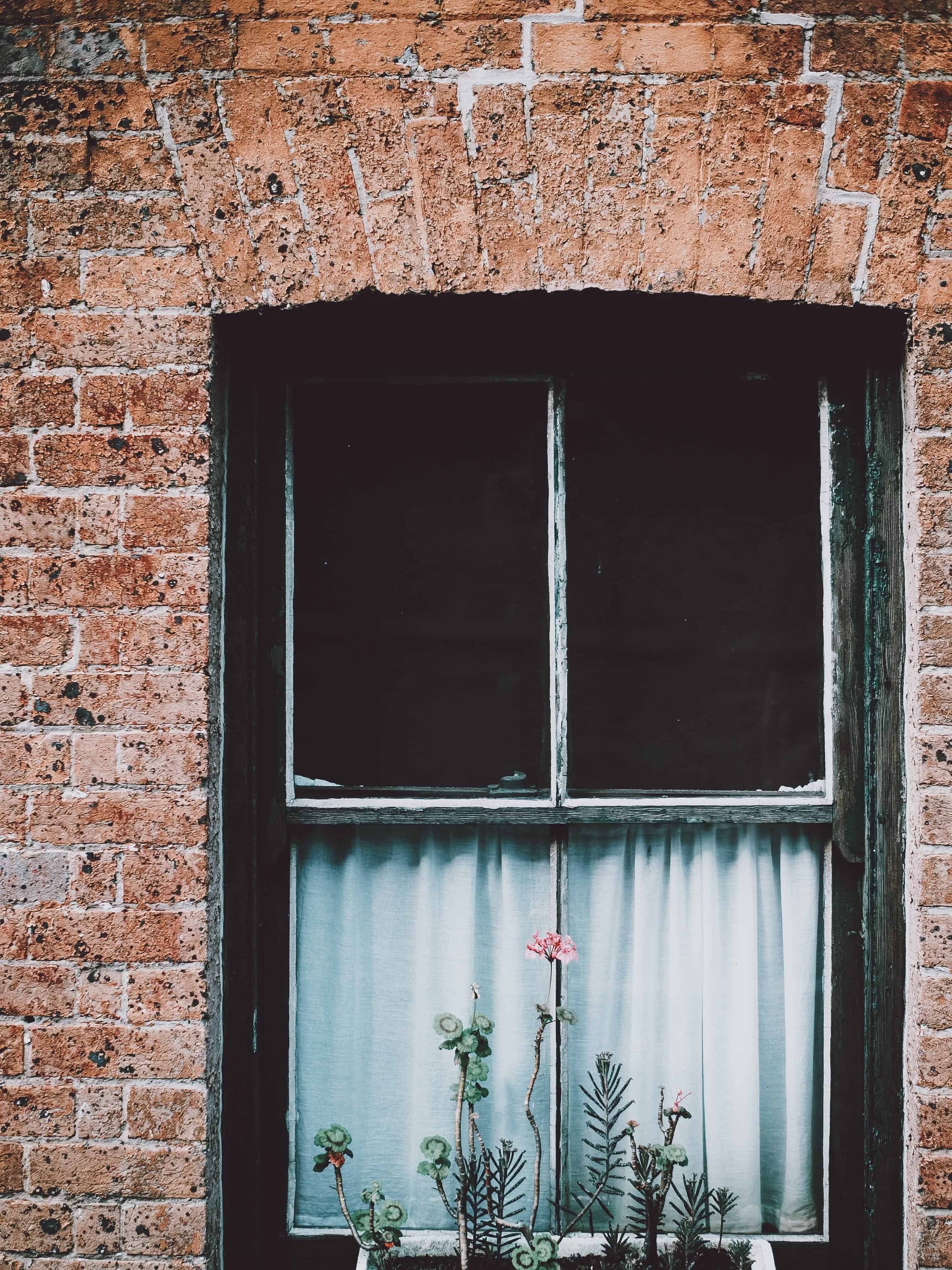 brick house window installation and upgrade