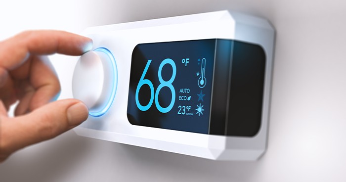To save money on your utility bill, set your programmable or smart thermostat to approximately 68 degrees Fahrenheit.