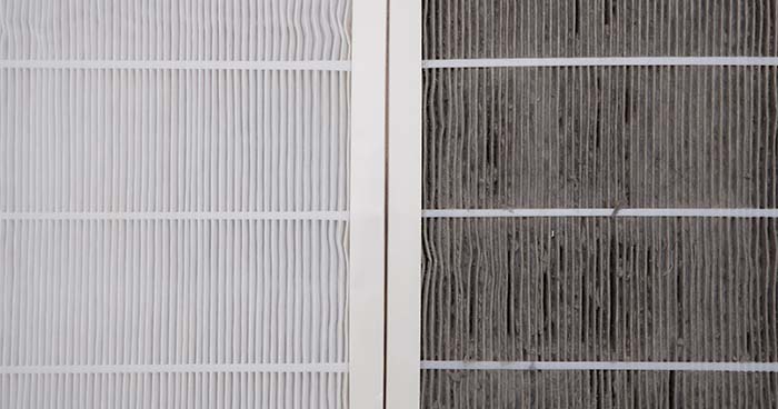 Image: side by side air filters, one clean and one dirty.