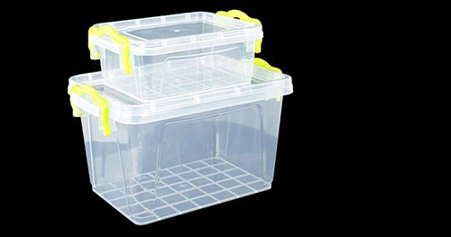 Image: transparent storage bins used for organization.