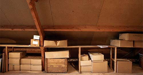 Image: shelves and storage in an attic.