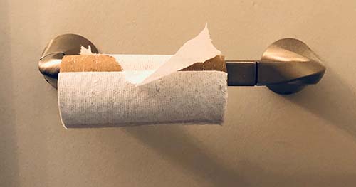 Image: a roll of toilet paper that's almost done.